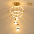 Modern 3-Ring LED Chandelier with 3 cascading globe pendants and warm white glow – Luxury Fancy Ceiling Light Pakistan