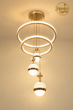 Modern 3-Ring LED Chandelier with 3 cascading globe pendants and warm white glow – Luxury Fancy Ceiling Light Pakistan